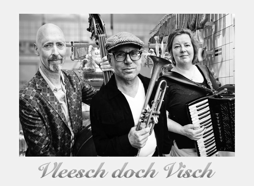 Band photo, b&w portrait of three persons holding instruments