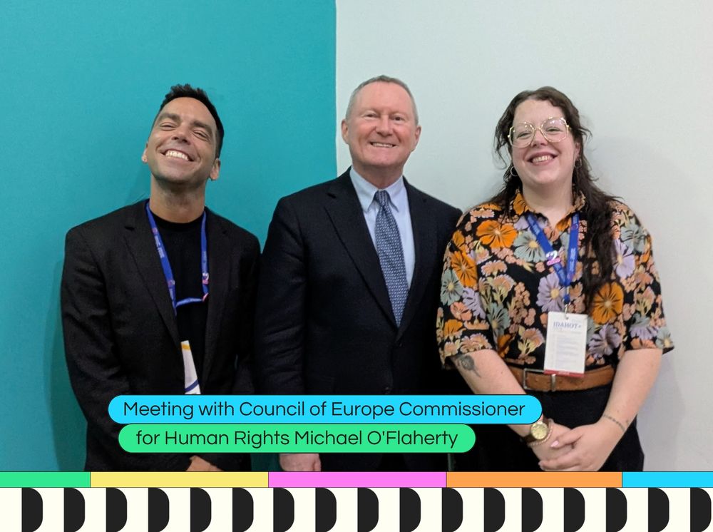Photo of Rú and Bella from the IGLYO team with the Council of Europe Commissioner for Human Rights Michael O'Flaherty at the IDAHOT Forum+ in Malta.
