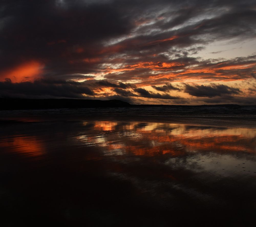 Cloud patterns reflected on Tullan Strand, Donegal, Ireland. 