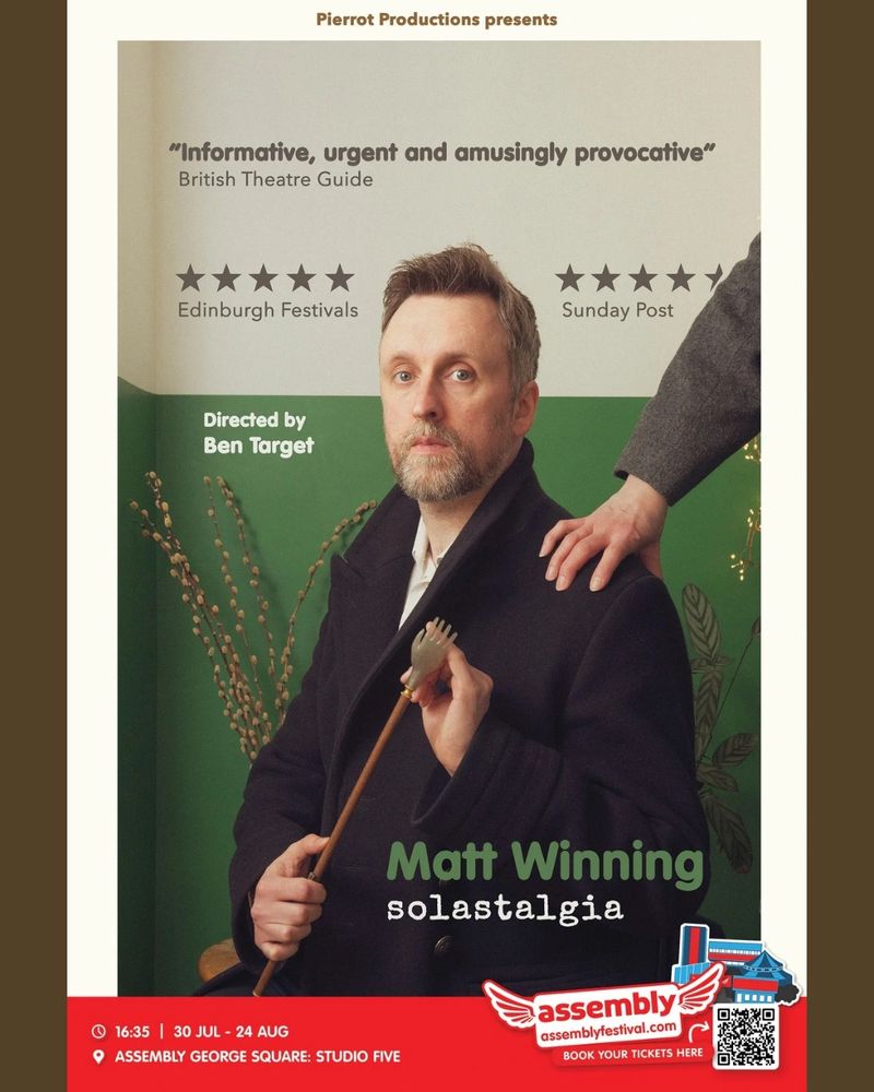 Poster for Matt Winning's show Solastalgia at Edinburgh Fringe 2025. Matt is in formal attire & sat against green and white with a back-scratcher in his hand with a tiny and on the end of it against his left pinky. Another human hand is holding Matt's left shoulder. 