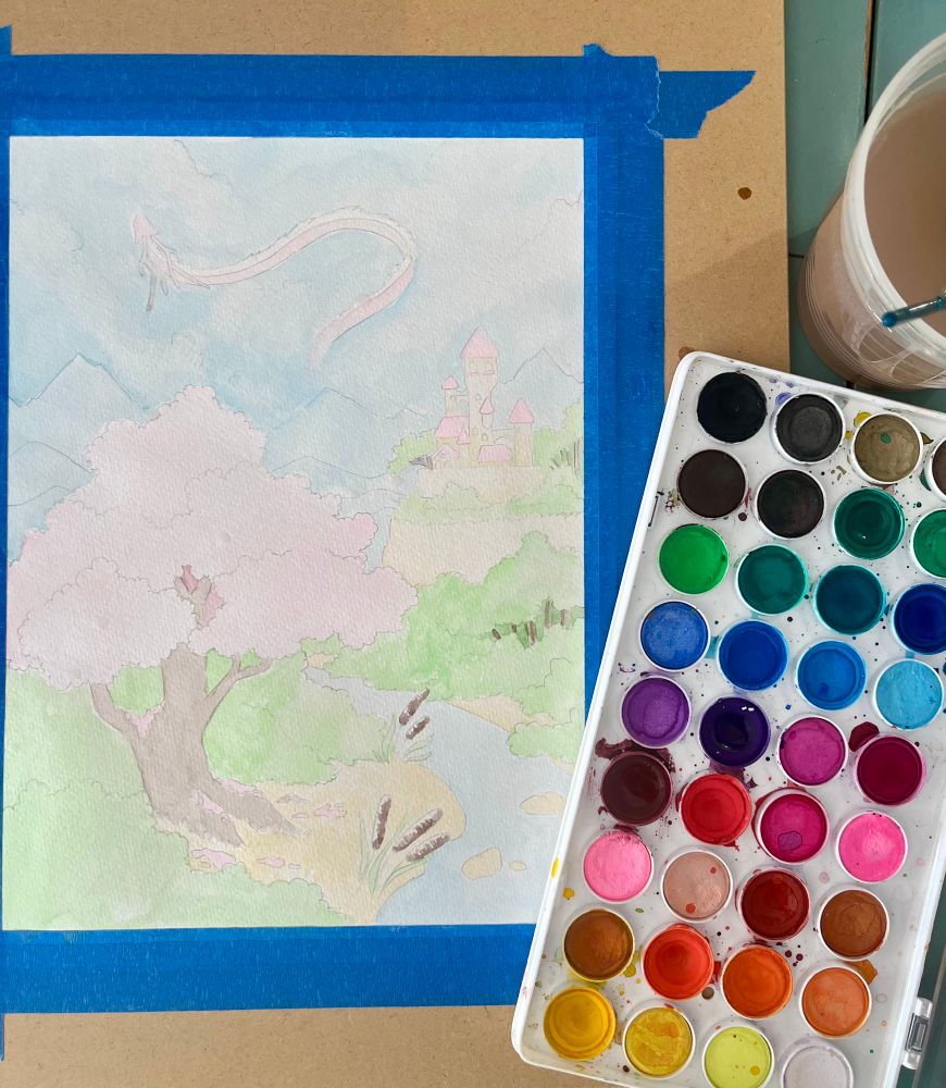 A wip image of a classic fairytale scene, a dragon in the clouds, a white and pink castle on a hill in the background, and a magical tree over a brook. Accompanied by a pallet of watercolors. 