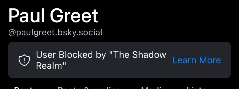 A screen cap of bluesky user Paul Greet’s page.  The user has been blocked by “The Shadow Realm.”
