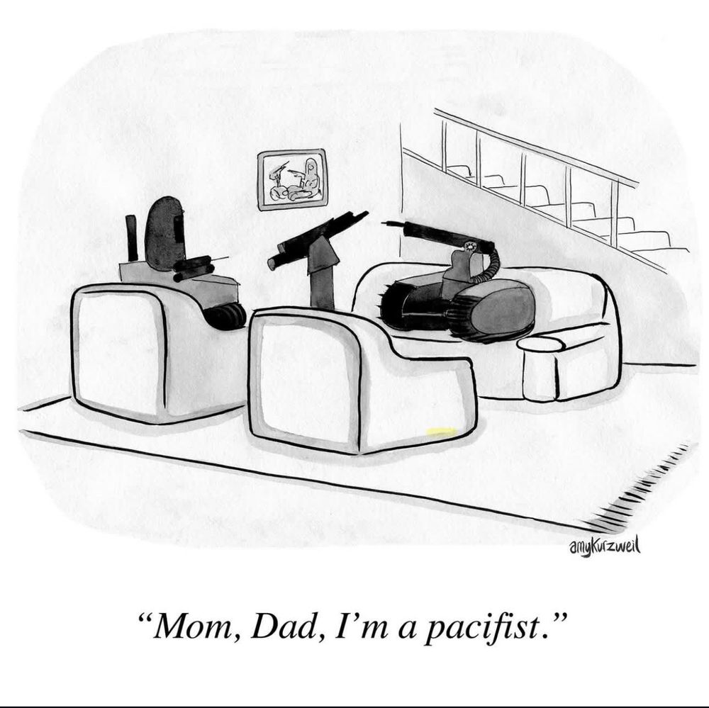 The cartoon shows two tanks outfitted with cannon barrels, seated in armchairs in a suburban-style living room. Between them sits a smaller tank, positioned on the couch. A framed drawing of a war scene hangs on the wall. 

The caption below reads:

“Mom, Dad, I’m a pacifist.”