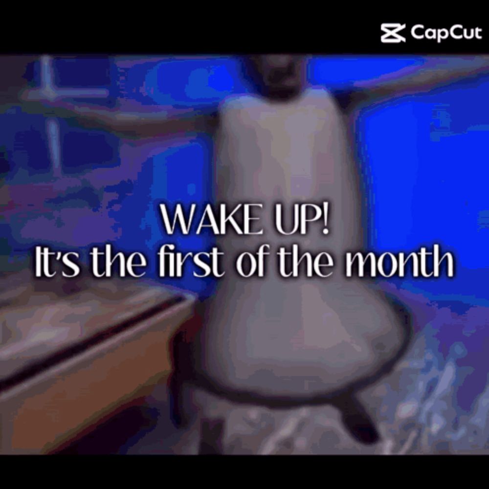 wake up it 's the first of the month with a person sitting in a chair