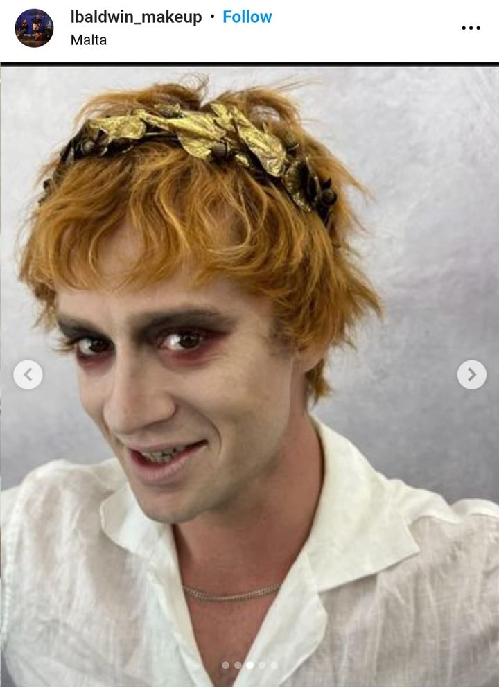 A picture of the actor playing the emperor twin without the monkey in Gladiator 2 taken by the lead make up artist off camera.

He looks gaunt and kind of creepy (which he's supposed to) but his genuine smile for the picture is quite disarming and charming nonetheless.