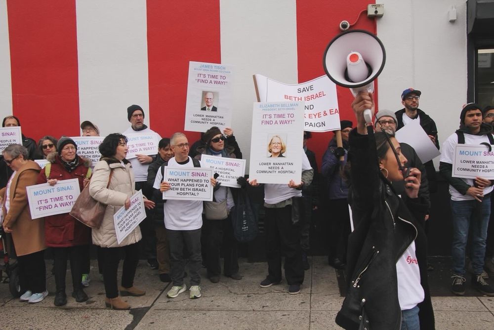 Sarah with a megaphone leading a demonstration against the closing of Mount Sinai Beth Israel