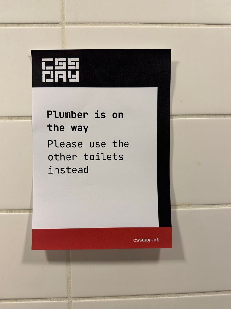 A note on a tiled wall with the text: 

A Plumber is on the way
Please use the other toilets instead