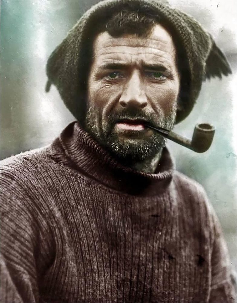 Tom Crean, in serious mode looking straight down the lens with his pipe held firmly between gritted teeth. 