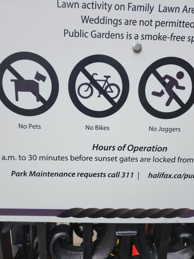 Sign: no pets, no bike, no joggers (sic!)