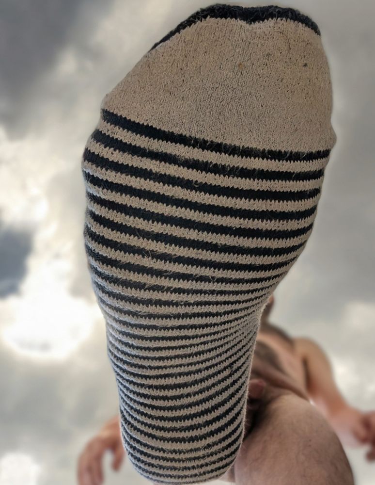 Me wearing only socks, looming over you 