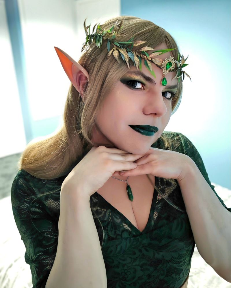 Aly dressed as an elf looking very pure and innocent