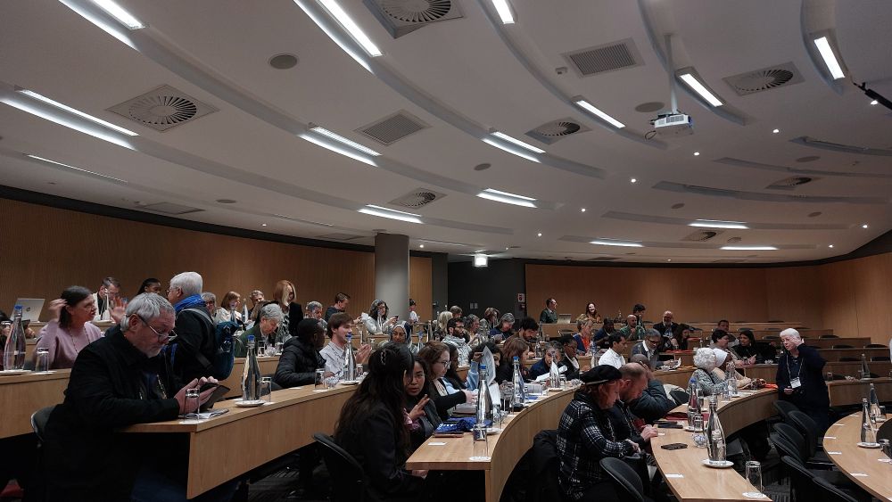 The crowd listening to the welcome words