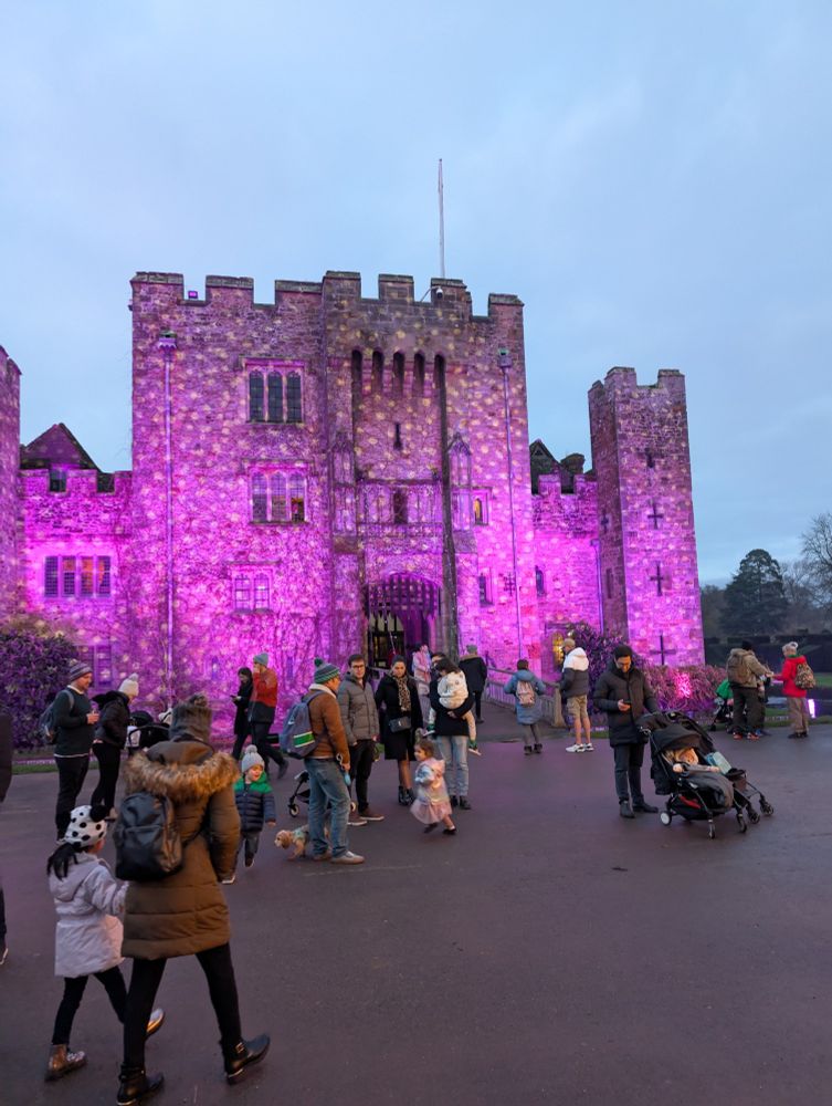 Hever castle lit up in pink lights