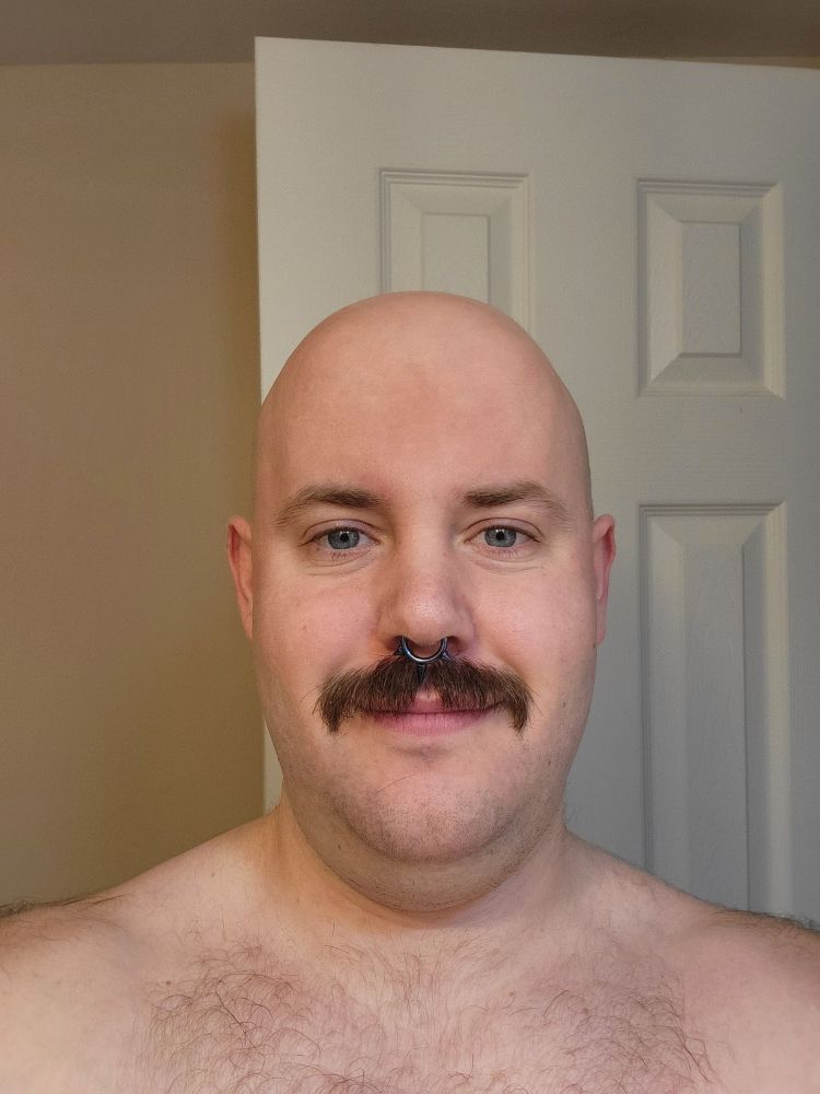 Mustachioed Cub with new septum ring