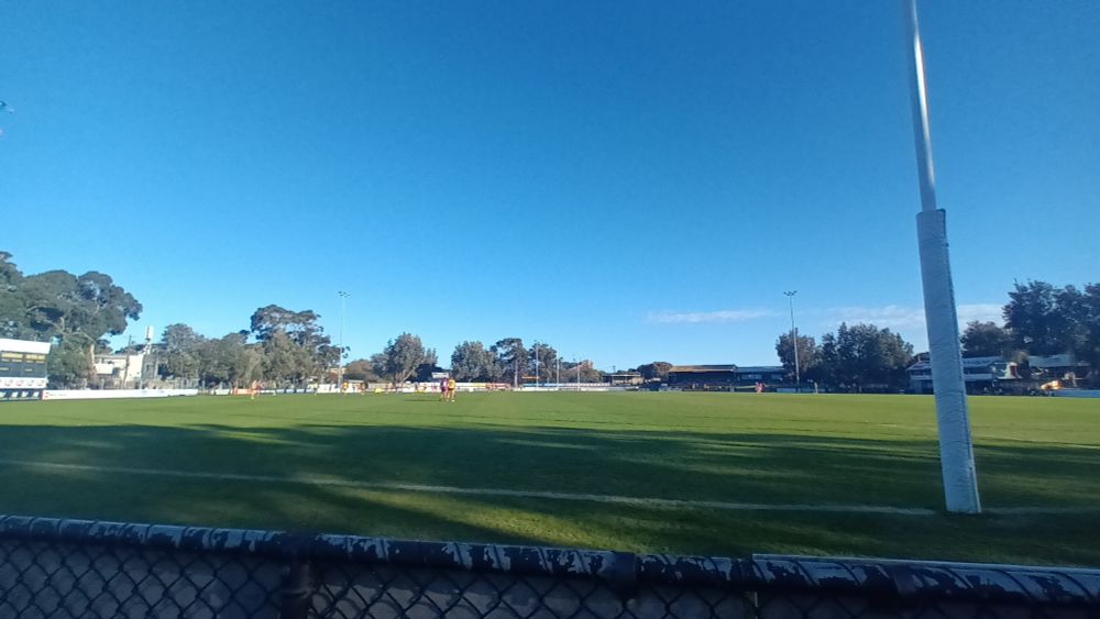 Trevor Barker Beach Oval with women playing Australian rules football. 