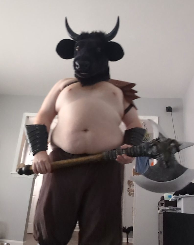 Me wearing a bull head mask, as part of my minotaur outfit for Halloween.