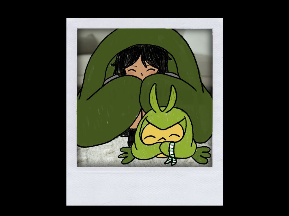 wrapped in a blanket next to swadloon