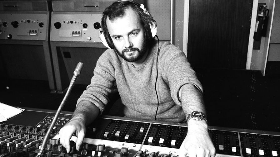 The inimitable John Peel at a microphone, announcing the new single from Velvet Milkman