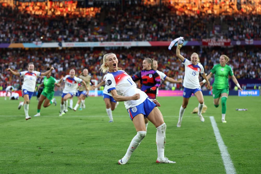 Lionesses celebrate the deciding penalty.