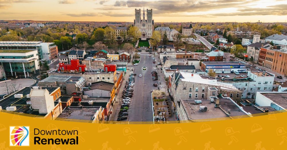 Aerial photo of Downtown Guelph with a decorative yellow bottom border and text that says "Downtown Renewal"