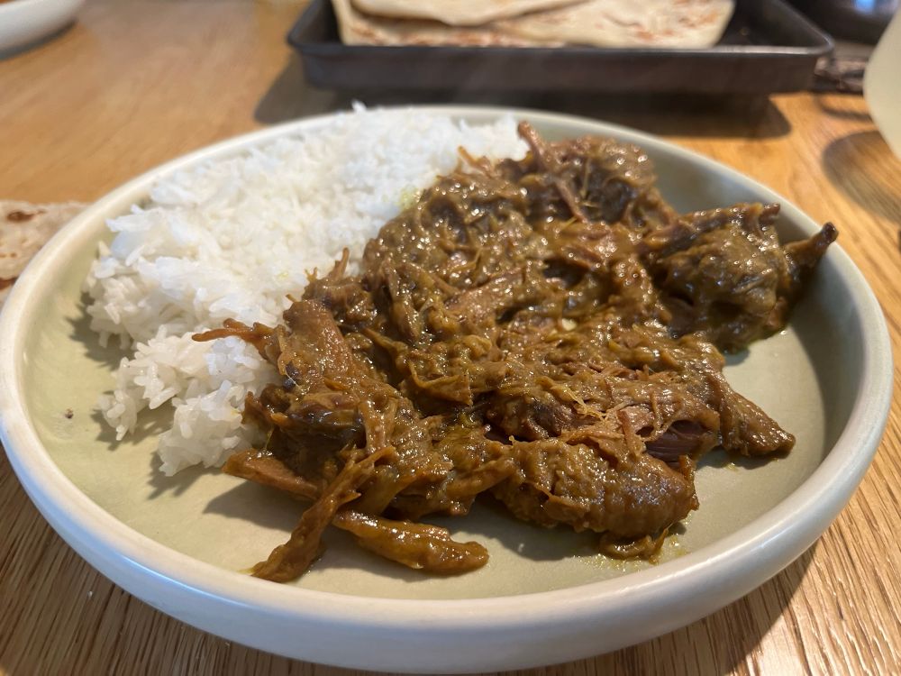 Beer rendang plated with basmati rice. Honestly it looks bad but iykyk