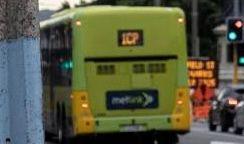 A green Metlink bus with the route indicator showing “1CP”