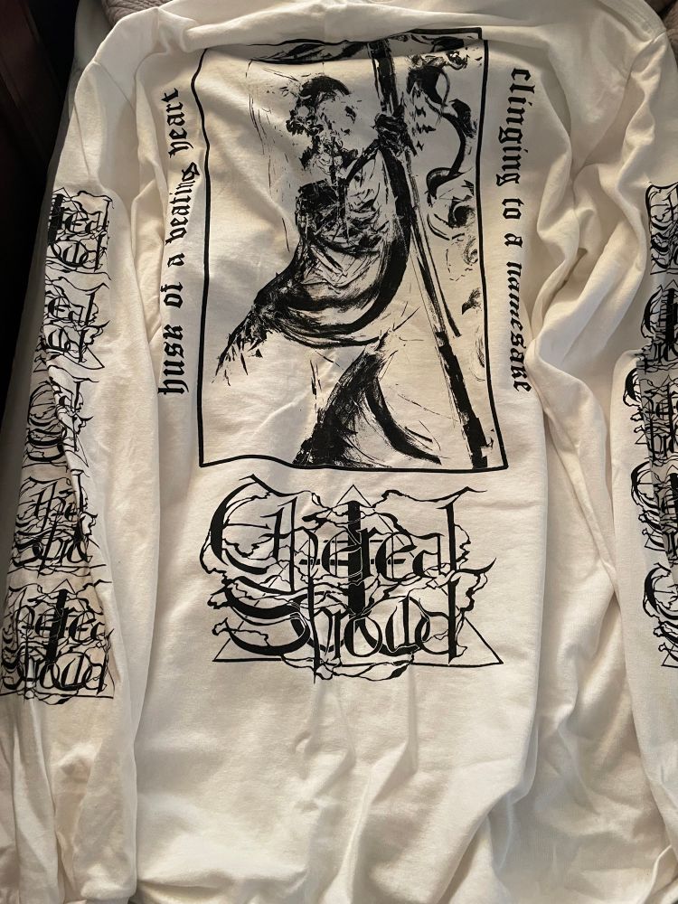 a photo of a white 4-sided longsleeve shirt for the band Ethereal Shroud