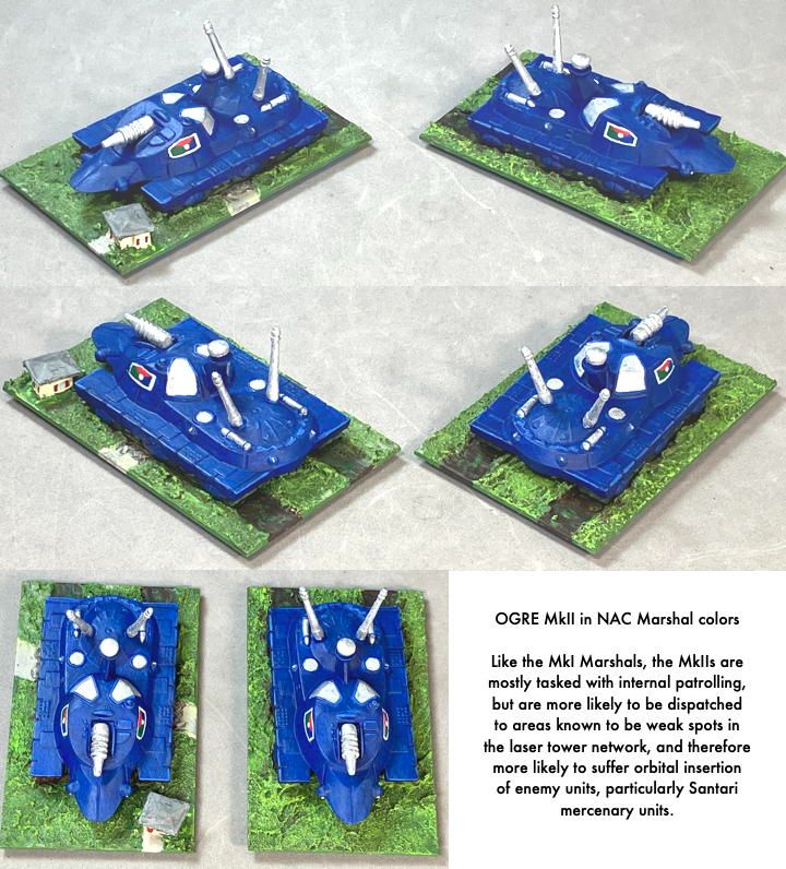 OGRE MkII miniatures painted in a mostly blue and silver scheme.