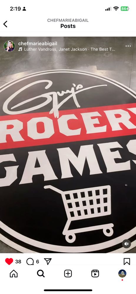 Guy's Grocery Games logo on the floor of the store