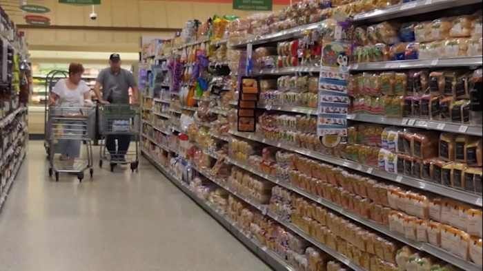Families are already feeling the pinch as grocery prices outpace inflation and economists warn the latest round of tariffs could drive prices even higher.