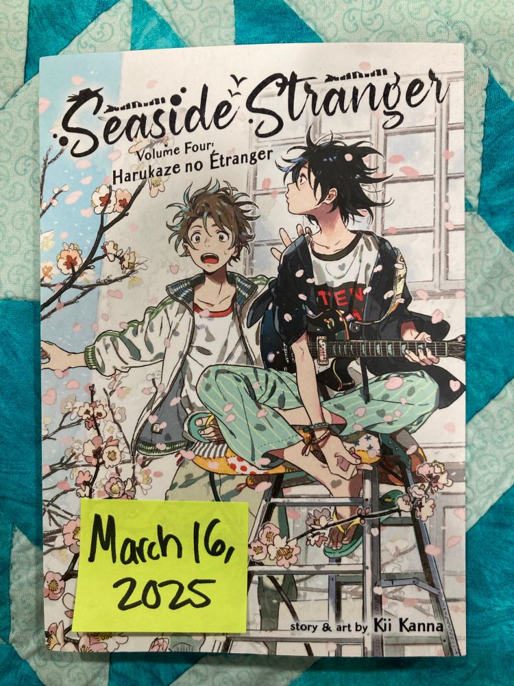 A picture of the cover of Seaside Stranger manga by Kii Kanna. There is a sticky note on the front that says “March 16, 2025” which is when I finished the book. 