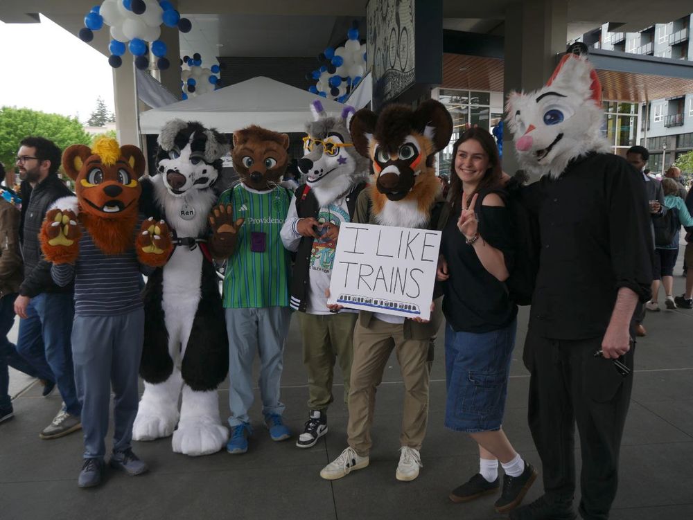 A group photo of 6 fursuiters.