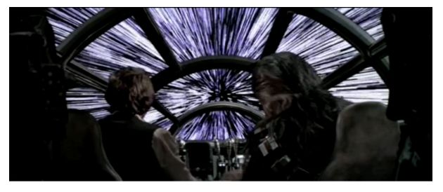 Image de Han Solo et Chewbacca passant en vitesse lumière à bord du Faucon Millenium.

Les étoiles semblent s'écarter les unes des autres.