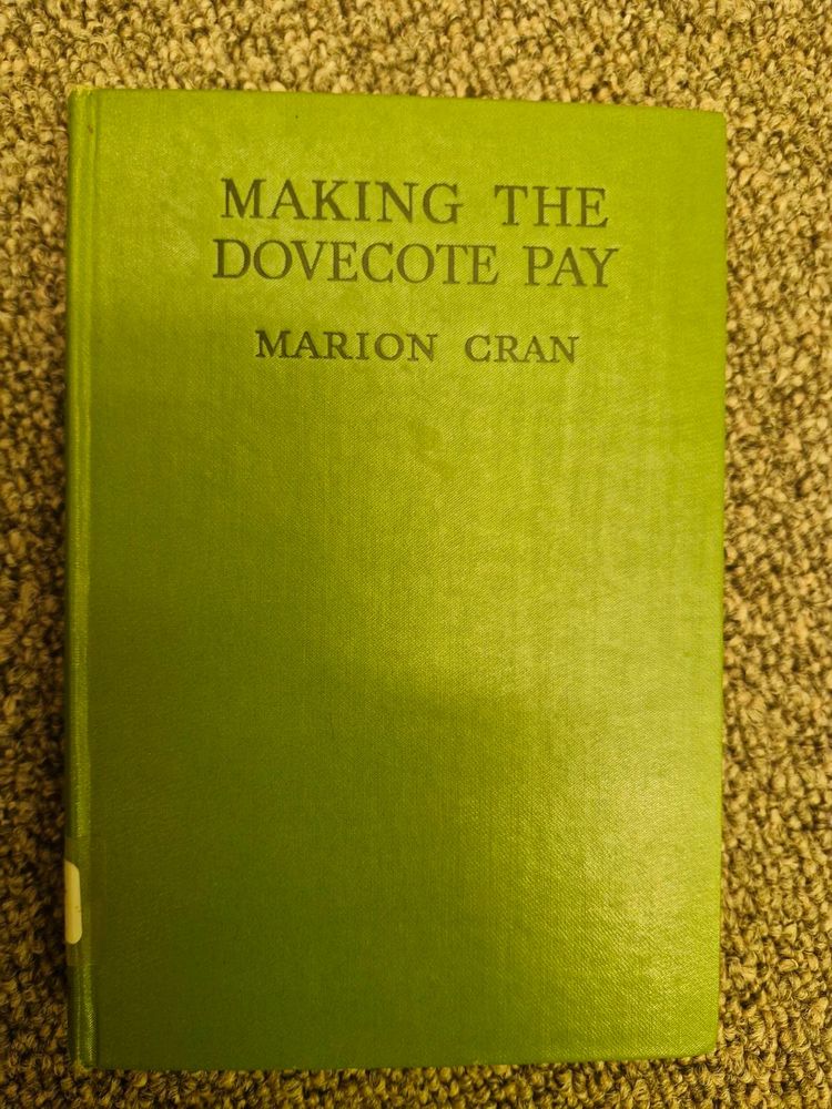 The cover of a book titled 'MAKING THE DOVECOTE PAY' by Marion Cran