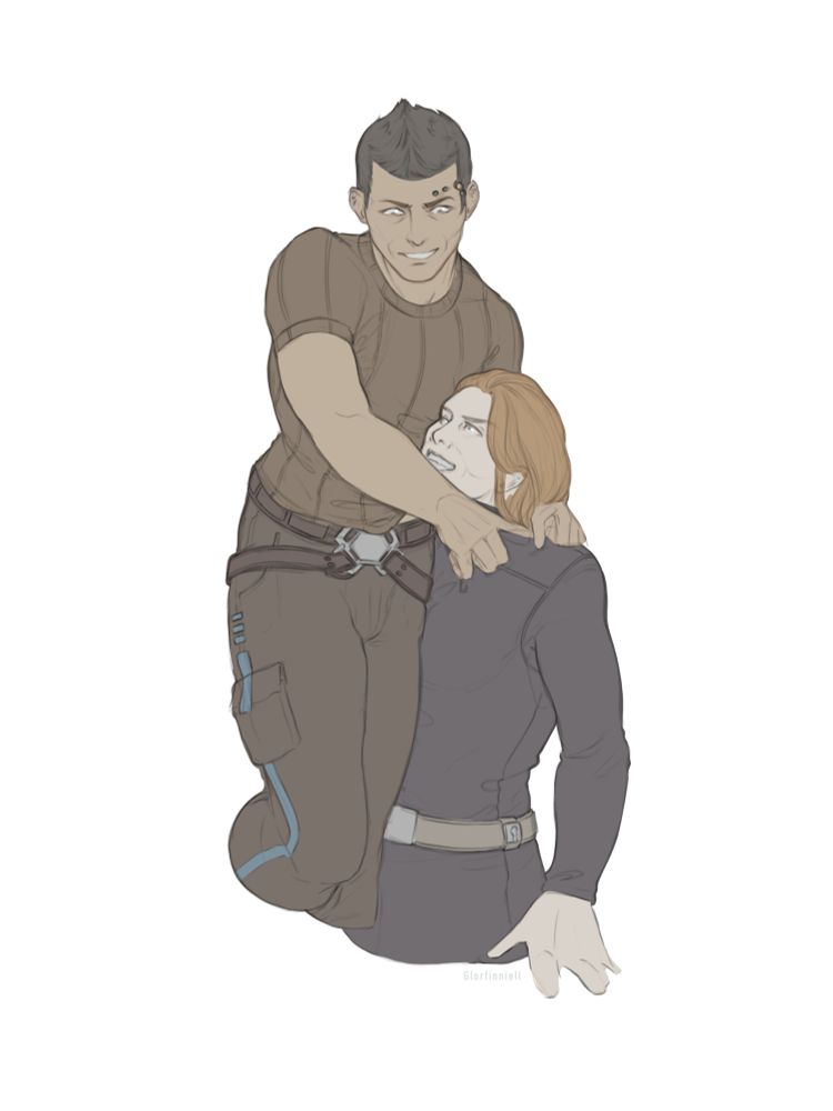 Theron Shan being lifted but a ginger woman.
