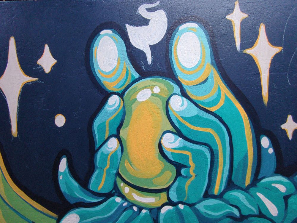 A close up of the face of the creature