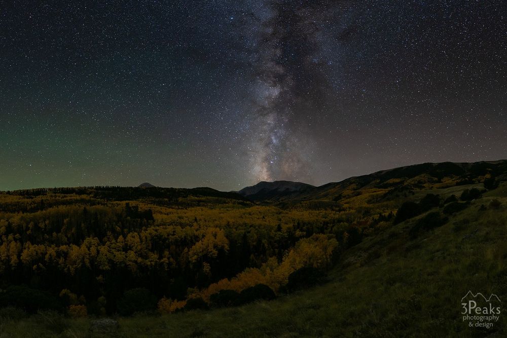 This is a tracked panorama of the Milky Way and Colorado fall colors.