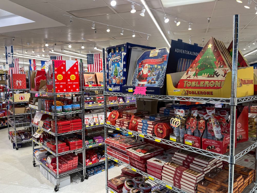 Shelves packed with winter holiday treats from around the world at Global Foods, an international grocery store in Kirkwood, MO.