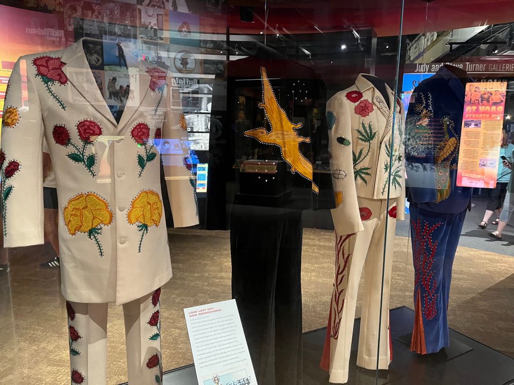 A display at the Country Music Hall of Fame featuring the suits worn by the Flying Burrito Brothers as they appear on their album The Gilded Palace of Sin. The suits were made by famous tailor-to-the-stars, Nudie Cohn.