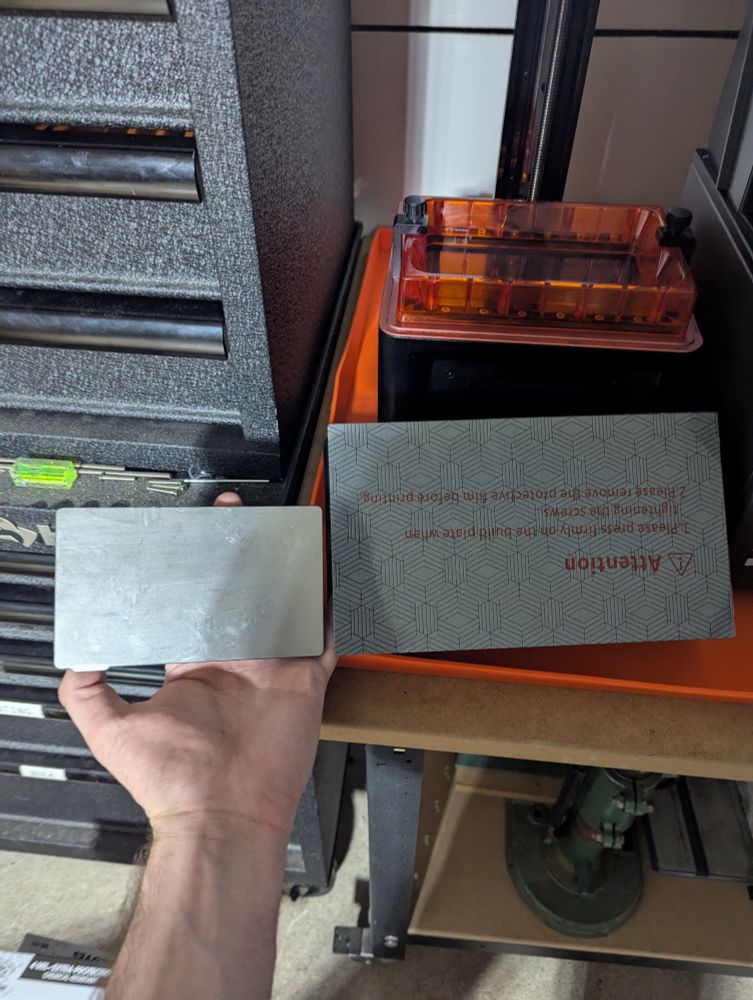 Elegoo Saturn 4 ultra 16k next to mars 2 pro build plate size comparison