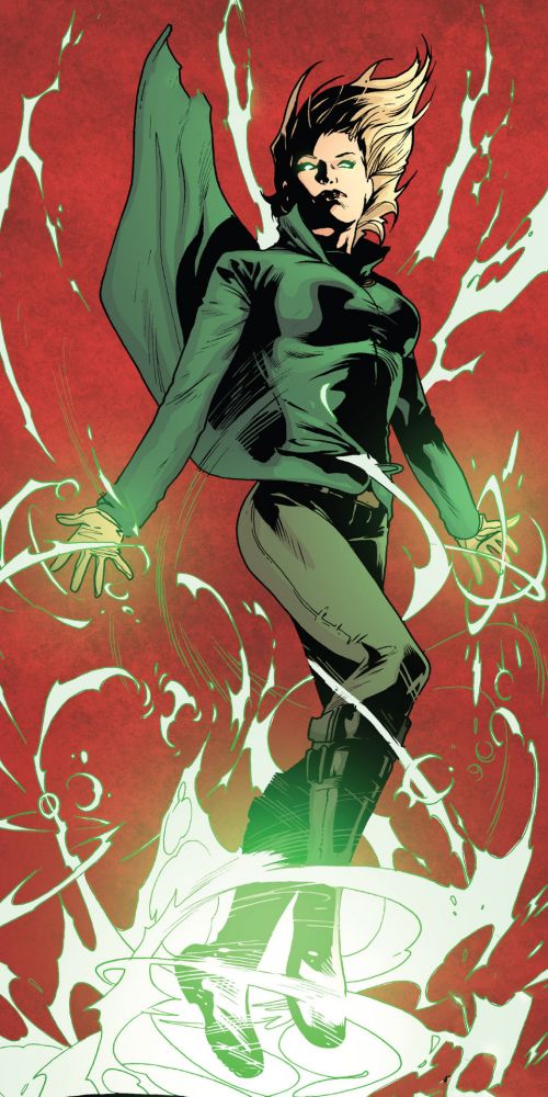 Une femme blonde habillée en vert environnée d'énergie de couleur verte. 

C'est la géomancienne de l'univers Valiant, Kay McHenry. 