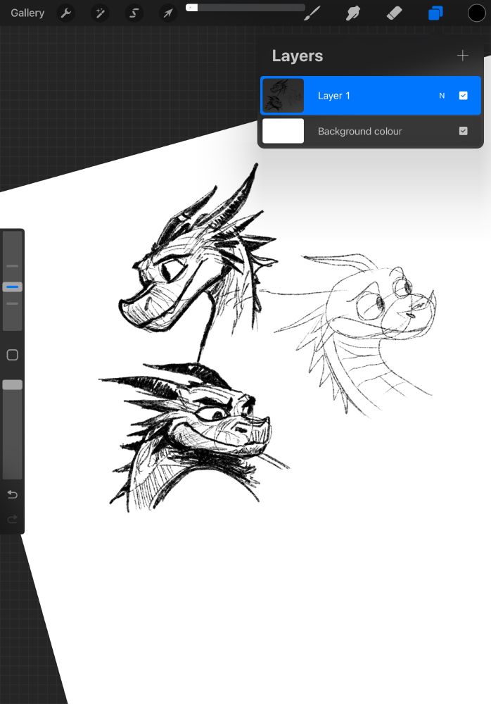 Screenshot. Work in progress. Sketch of a cartoon baby-dragon with various facial expressions. Two sketches are finished, the third one is just a draft.