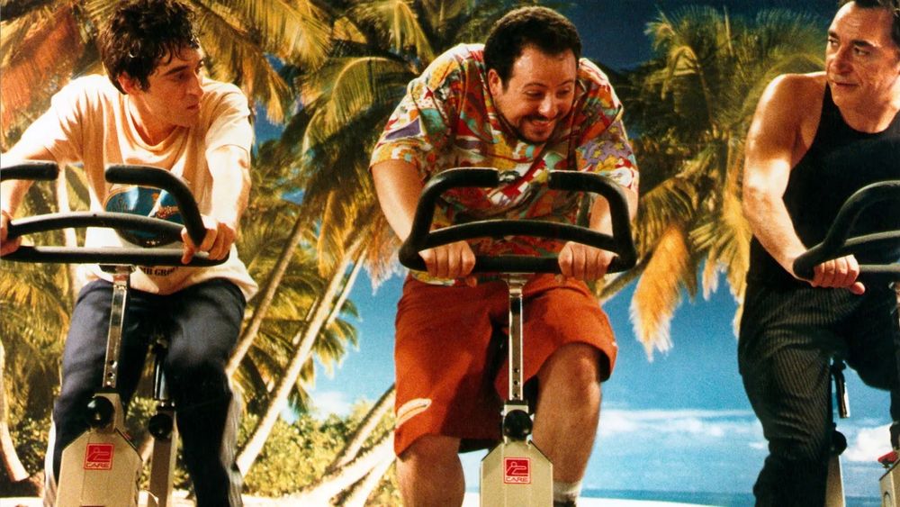 Jean-Claude (Mathieu Demy), Bob (Benoit Tachoires) et Luis (Richard Berry) sur des vélos d’appartement. Le deuxième rit.