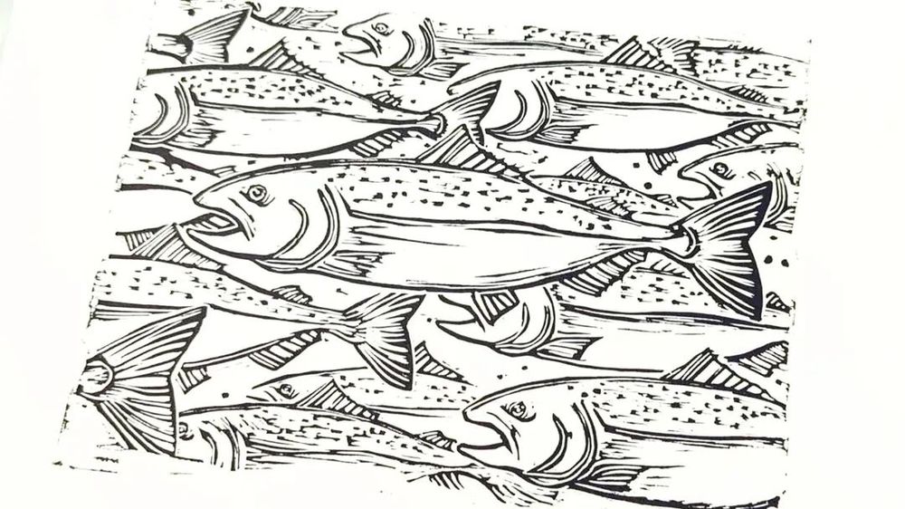 Lino artwork of a school of salmon
