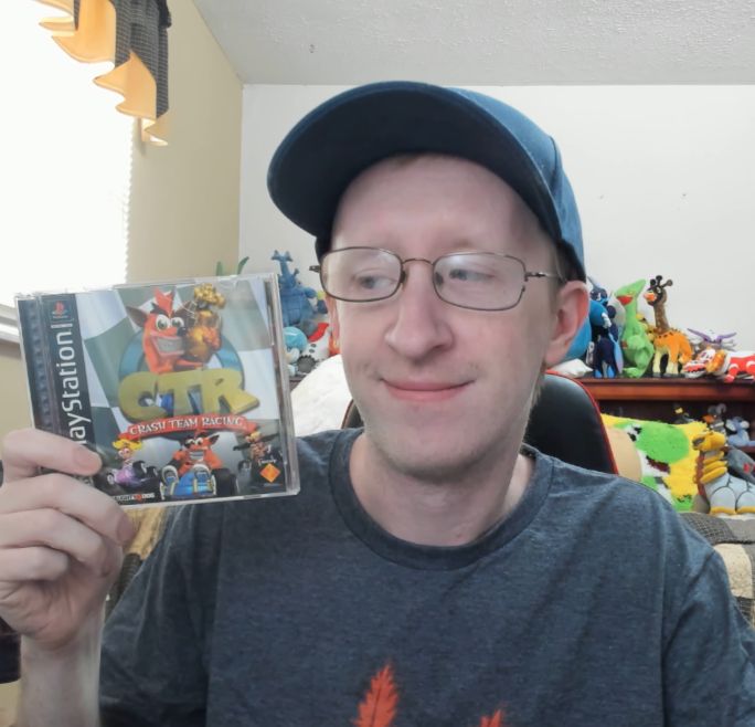 JB looking at his PS1 copy of Crash Team Racing