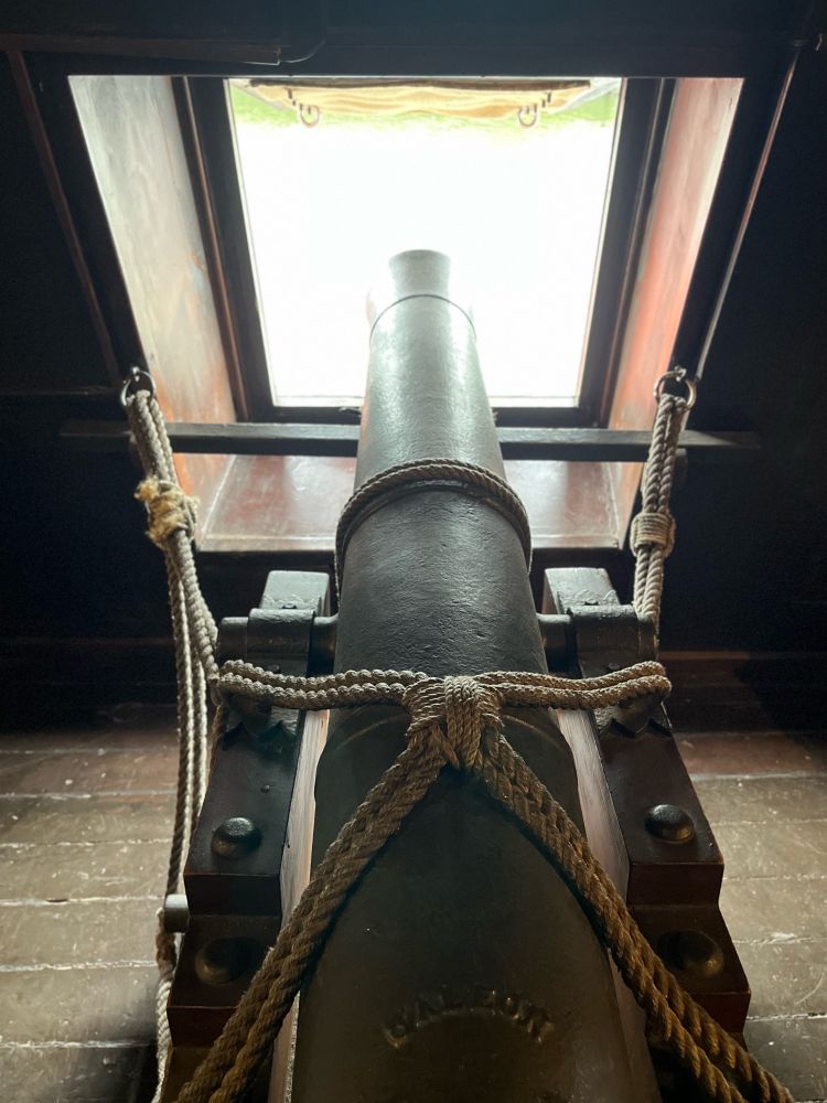 Photo of a replica canon on a Galleon.