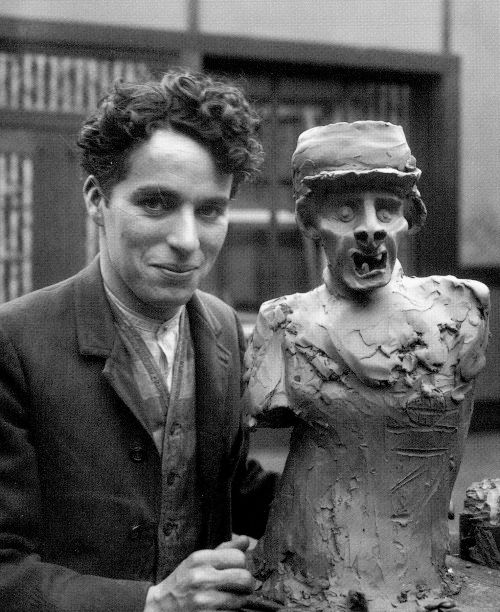 Chuck Chaplin and some sort of screaming clay sculpture