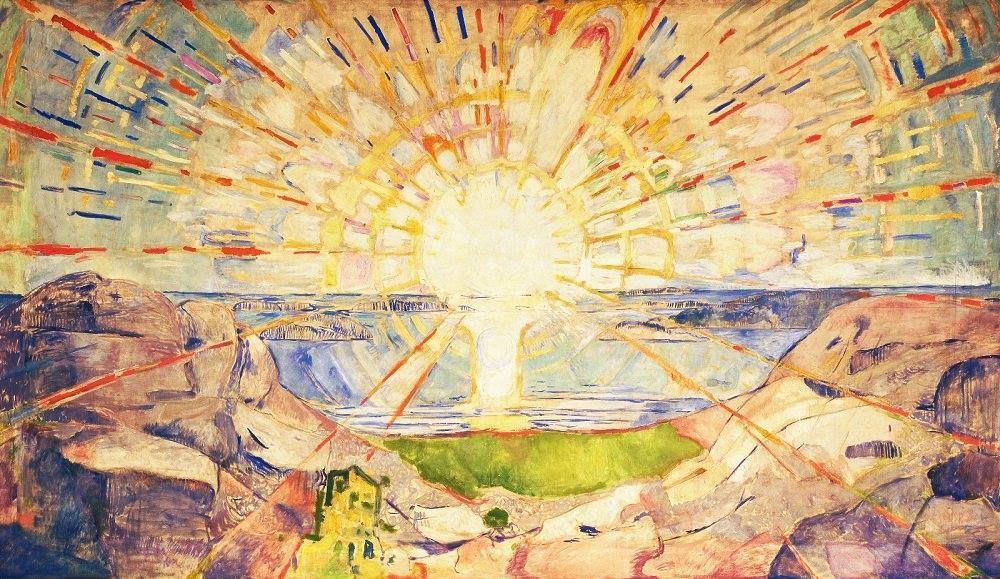 a bright and blazing sun over a landscape