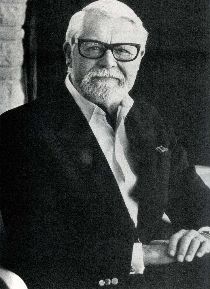 older man, sat facing the viewer