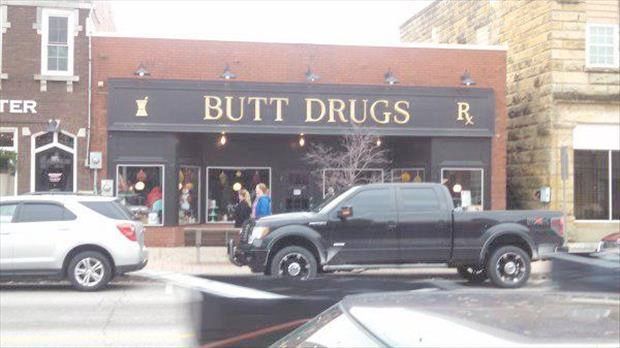 cars parked outside a shop the shops sign reads Butt drugs